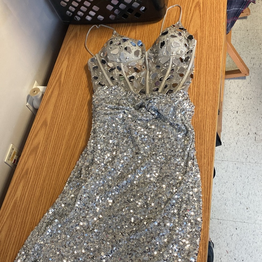 A prom dress! It is very tall, have be altered for a 5’1 woman size 14-16